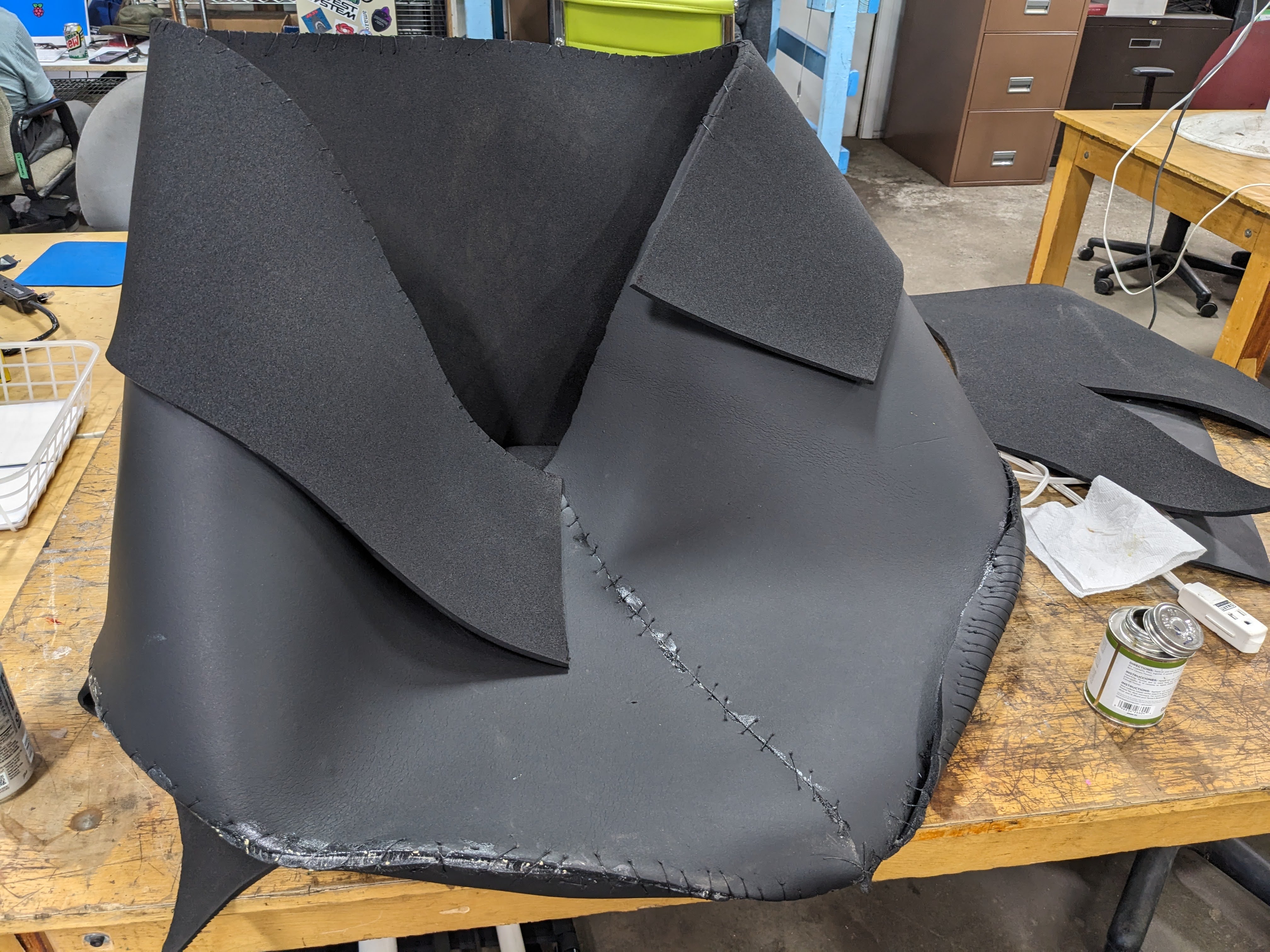 Sewing the midriff to the chest.
