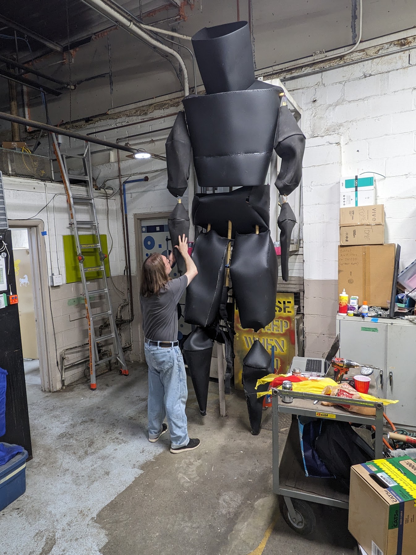 Foam Factory ran out of gymnasium-floor rubber, so I had to buy neoprene to make the arms. It's more crumply. Trying to un-crumple it.
